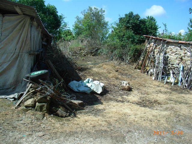 Casa de piedra con terreno