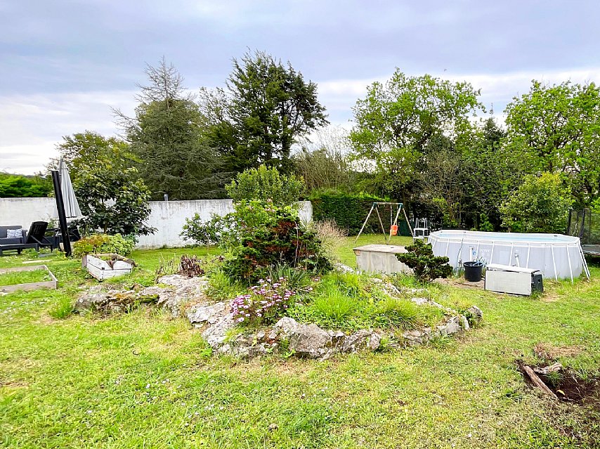 ESTUPENDA CASA CON JARDIN EN PUENTE ARCE
